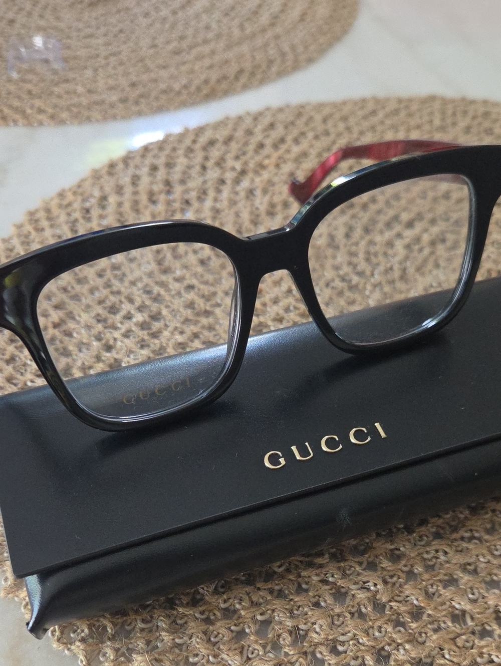 Gucci Women's Black Frame Eyewear with Subtle Red Temple Accent